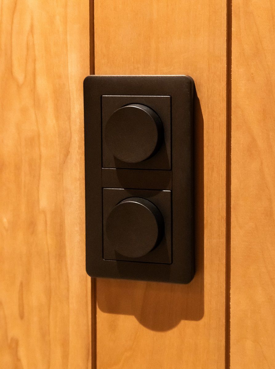 Two-piece black led dimmer for dimming and operating lights.